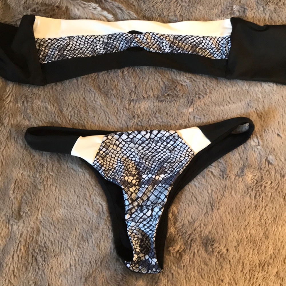Snakeskin bikini fits like a S